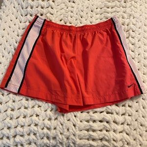 Coral Nike shorts